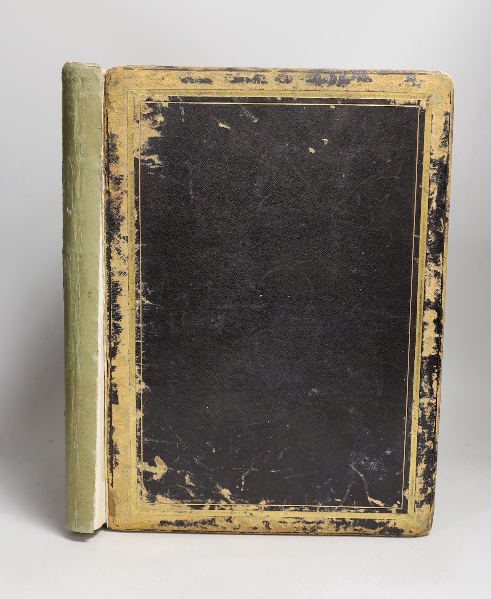 A photograph album, to contain religious and sacred sites throughout the United Kingdom, including Colchester, London, Bristol, etc.